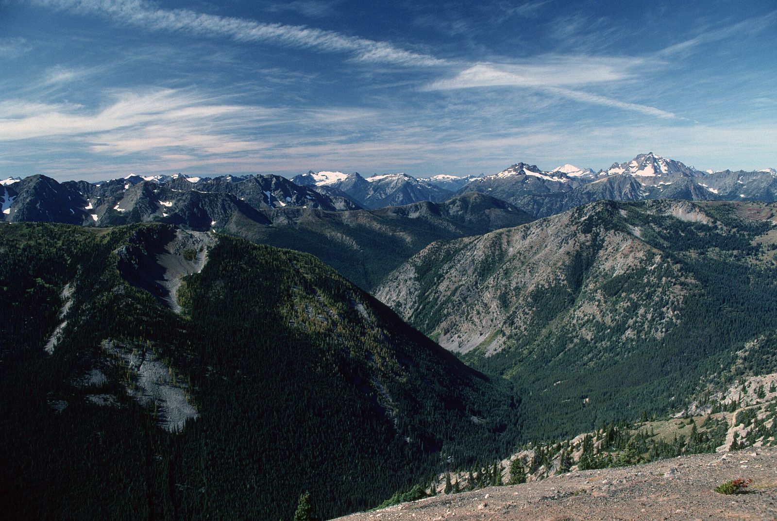 Layered mountain ridges and distant snowy peaks in the Pasayten Wilderness